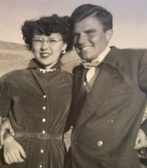 A person and person posing for a picture

Description automatically generated with medium confidence